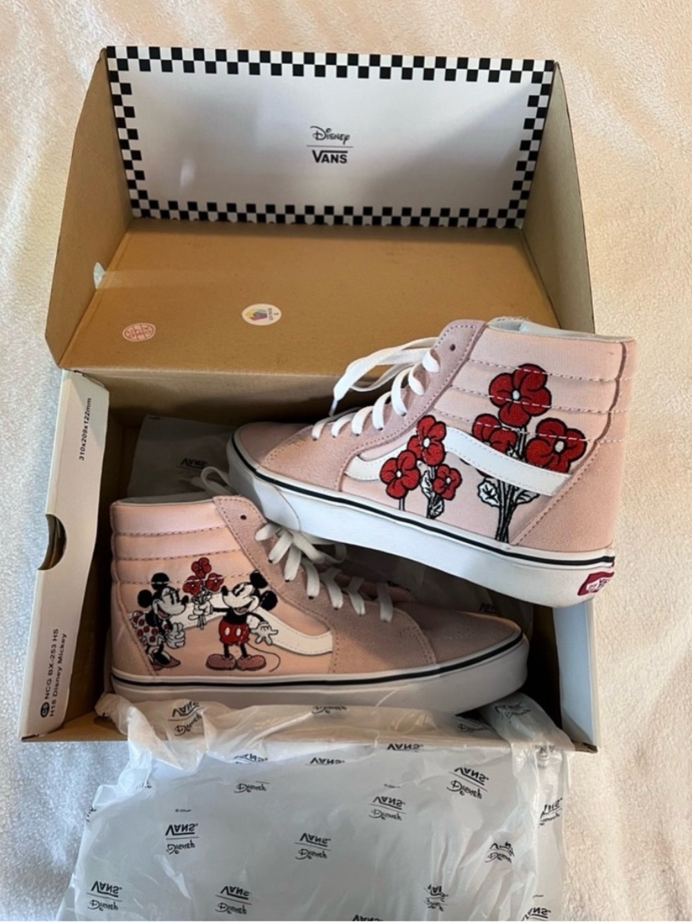 Limited edition Vans x Disney Sk8-Hi sneakers featuring Mickey & Minnie Mouse